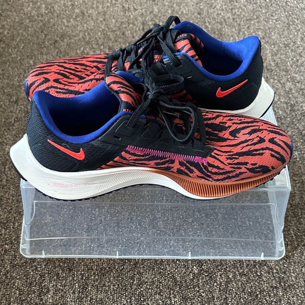 Womens Red and Black Zebra-Print Sneakers with Blue Lining